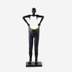 Man Carrying Pants Statue Floor Lamp